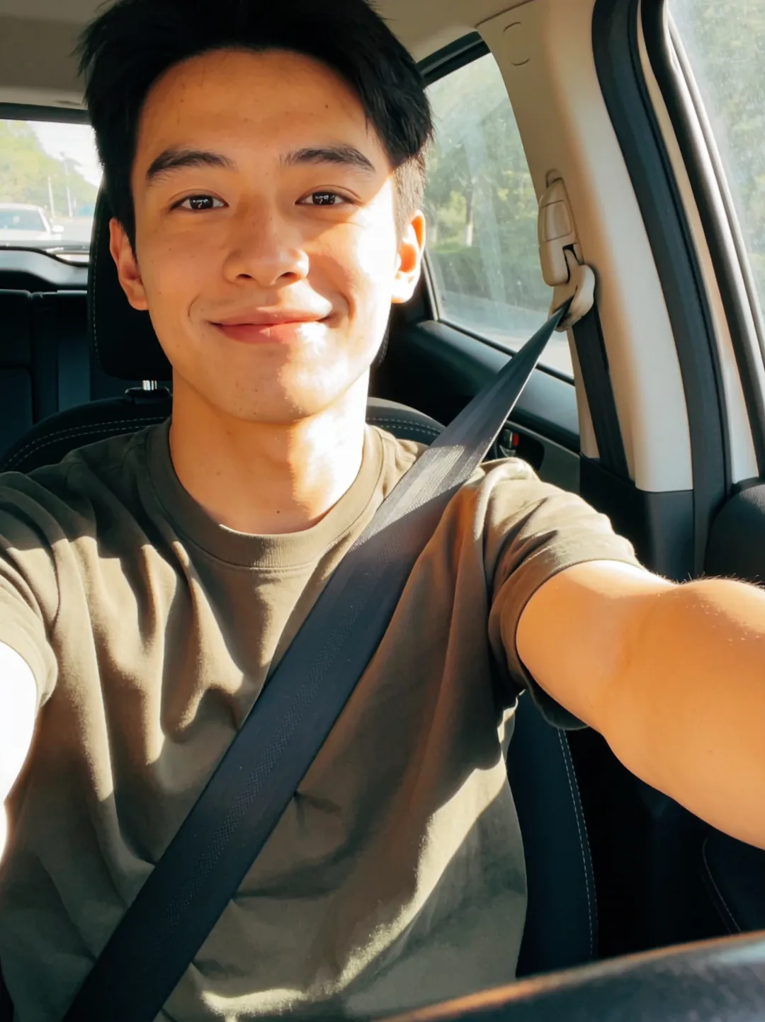 AI-generated image — source selfie of a young man in a green t-shirt, taken in a sunlit car