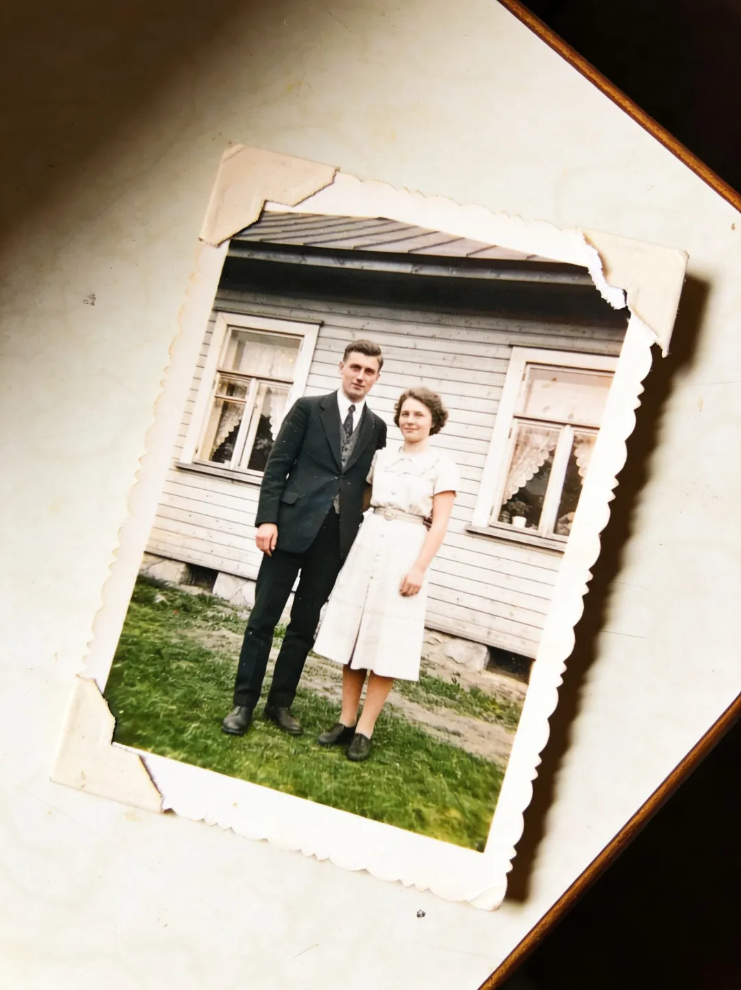 AI photo edit — after: the same portrait restored and colorized, with damage removed and natural color added